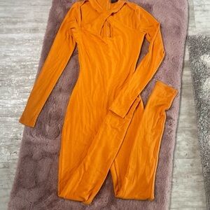 Naked wardrobe orange cross jumpsuit